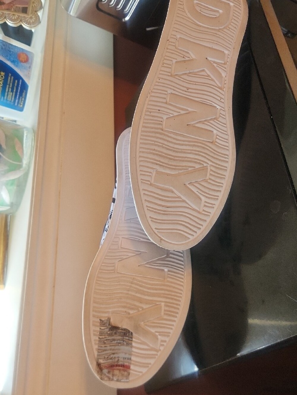 DKNY White and Black Graffiti Zip-Front Slip-On Sneakers with Branded Pull - Picture 3 of 5